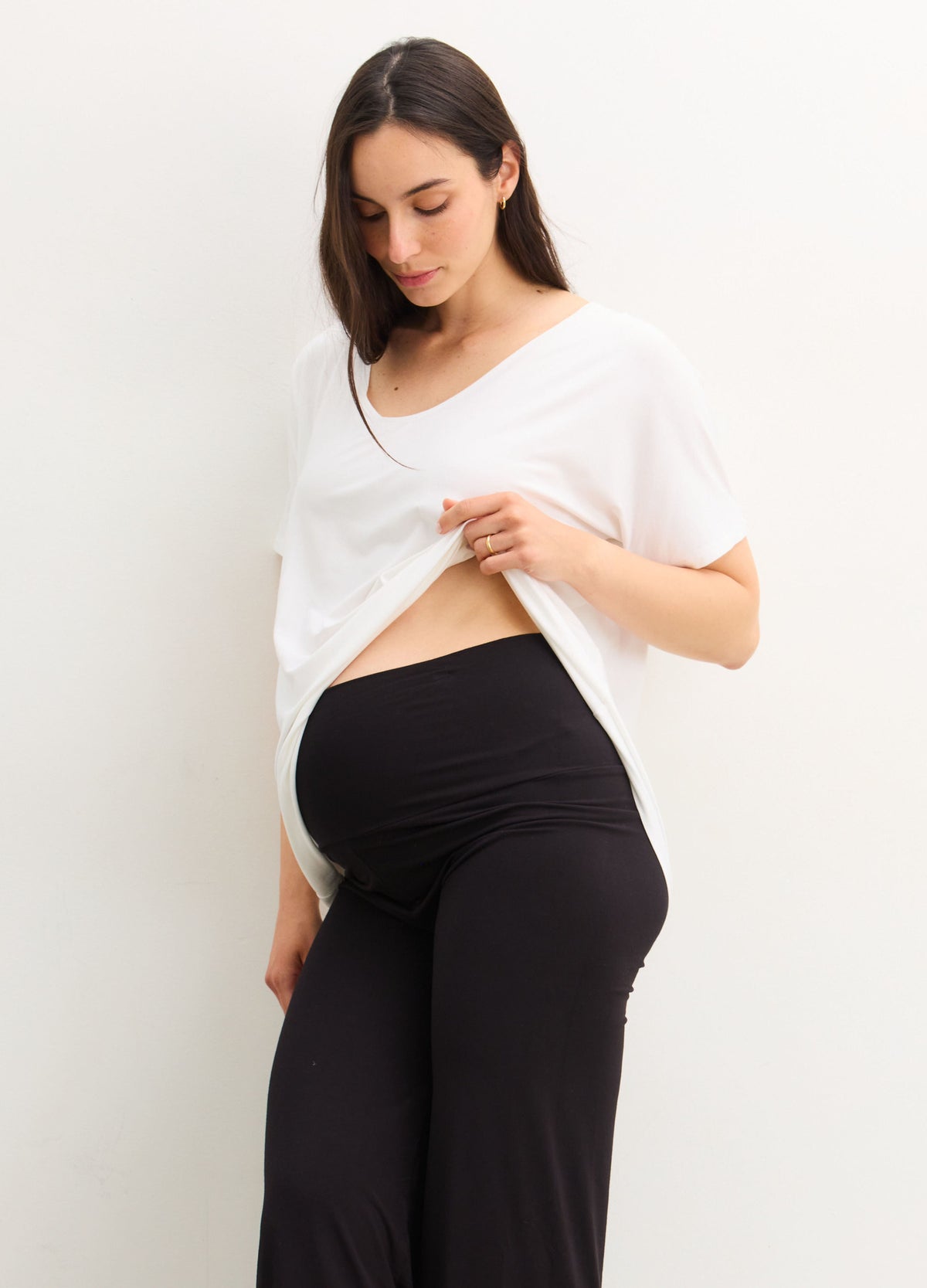 The Perfect Vee - White maternity V-neck top with short sleeves designed for pregnancy, nursing, and postpartum comfort.