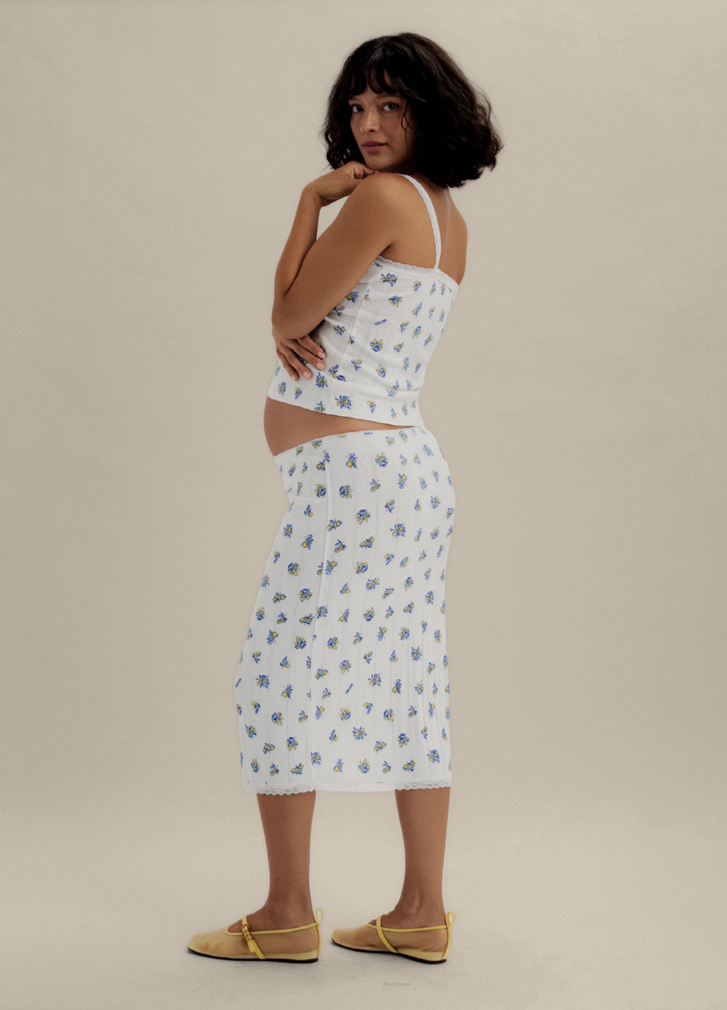White maternity cami and skirt set with blue floral pointelle pattern, slim fit with adjustable straps.