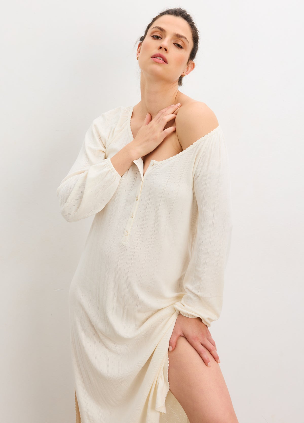 Cream-colored long sleeve nightgown with pointelle knit fabric, V-neckline, and relaxed fit.