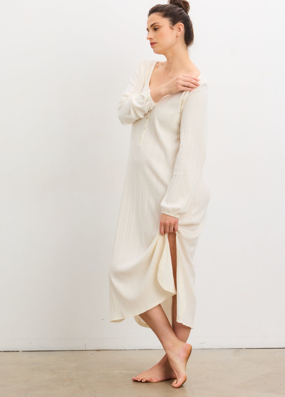 Ivory long sleeve pointelle knit nightgown with relaxed fit and midi length, soft breathable fabric.