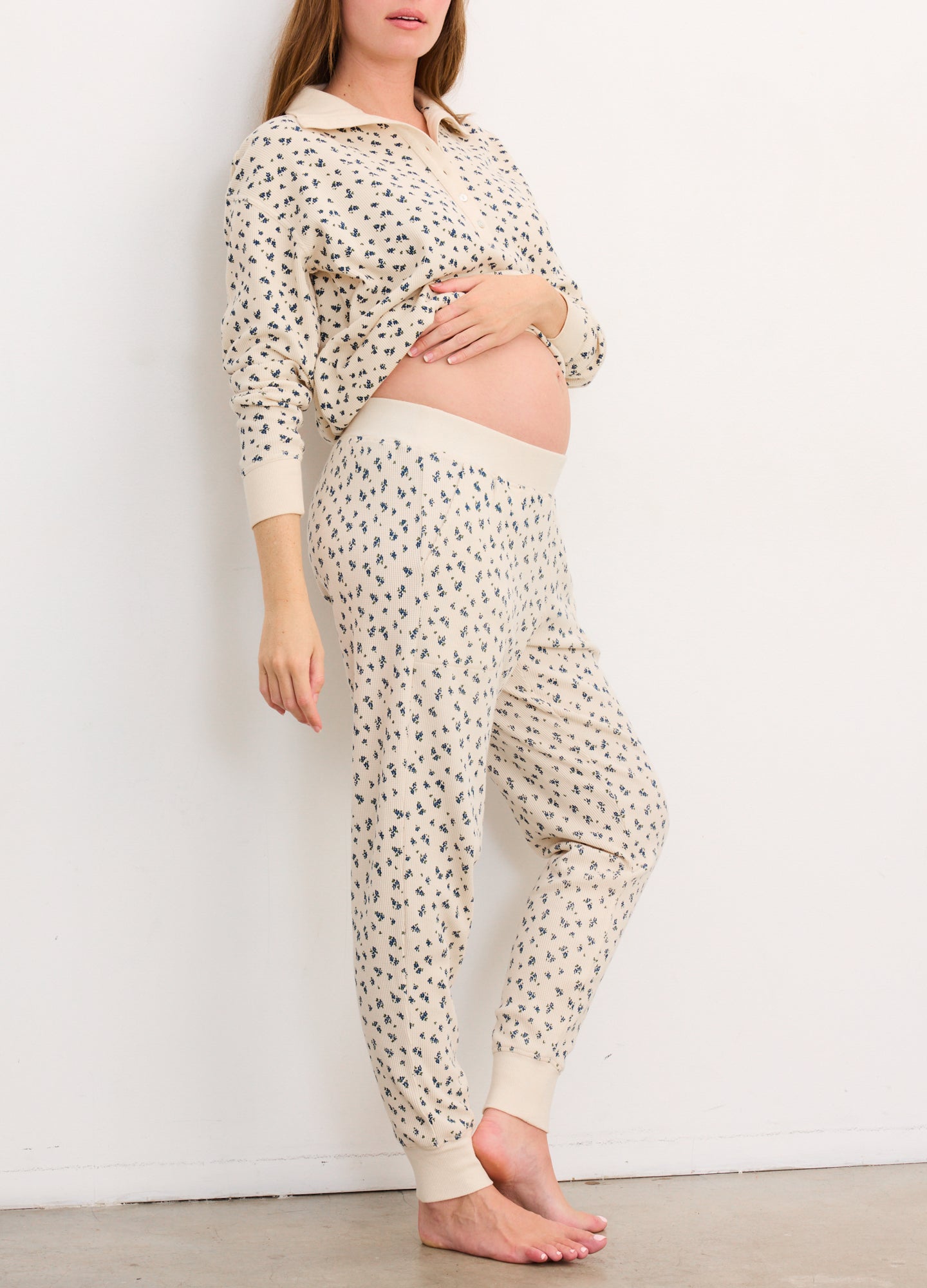 Cream-colored maternity waffle joggers with black and brown leopard print and a soft elastic waistband.