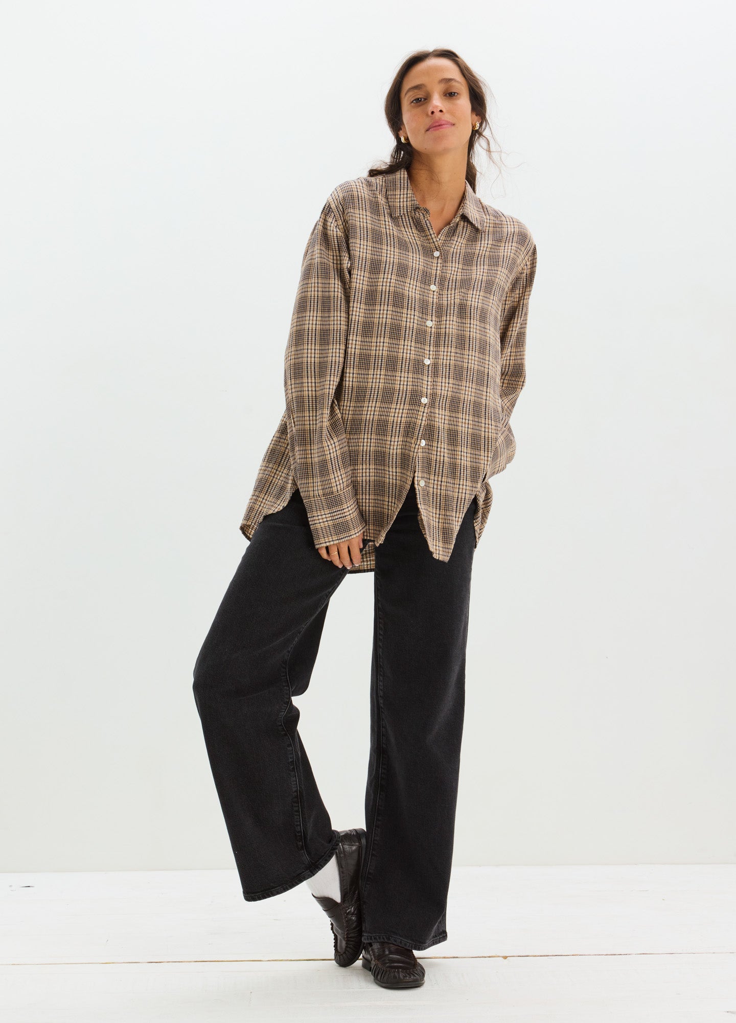 Black wide-leg maternity jeans with relaxed fit designed for pregnant women.