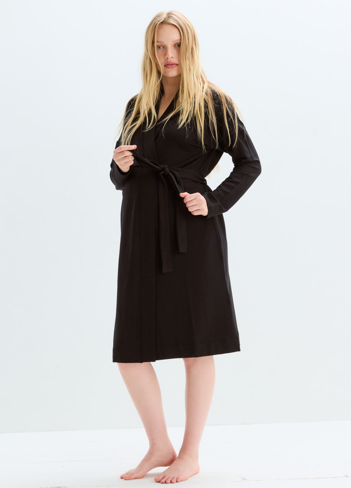 Black knee-length maternity robe with long sleeves and tie waist belt.