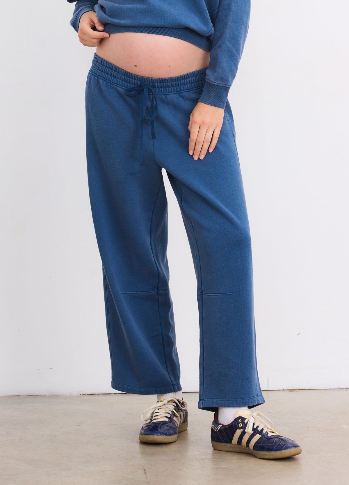 Blue Opal maternity sweatpants with adjustable drawstring waist designed for pregnant comfort.