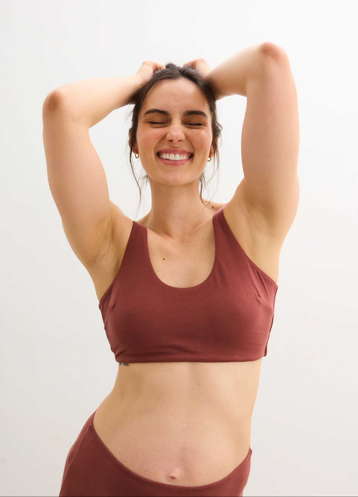 The Skin To Skin Bra - Soft anise-colored maternity bra with wide straps designed for nursing and postpartum comfort.