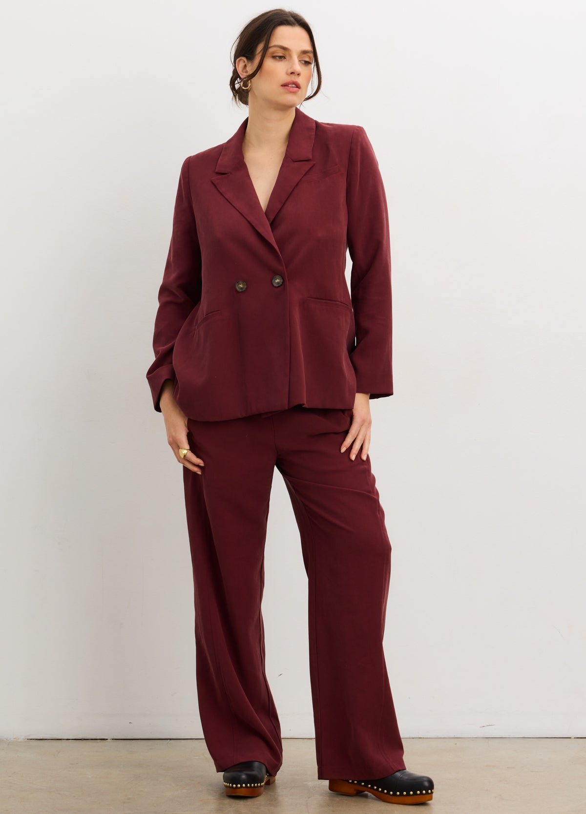 The Soft Tailored Pull On Trouser - Chocolate plum soft tailored maternity pull-on trousers with straight leg, paired with matching double-breasted blazer for before, during and after pregnancy.