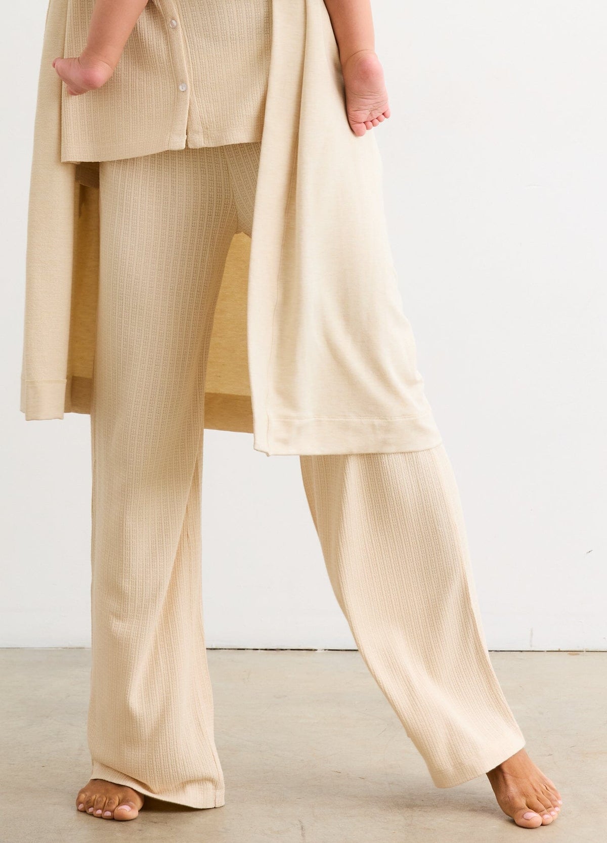 The Silky Ribbed Pointelle Easy Pant - Sand ribbed maternity pants with a relaxed fit, designed for pregnancy, nursing, and postpartum comfort.