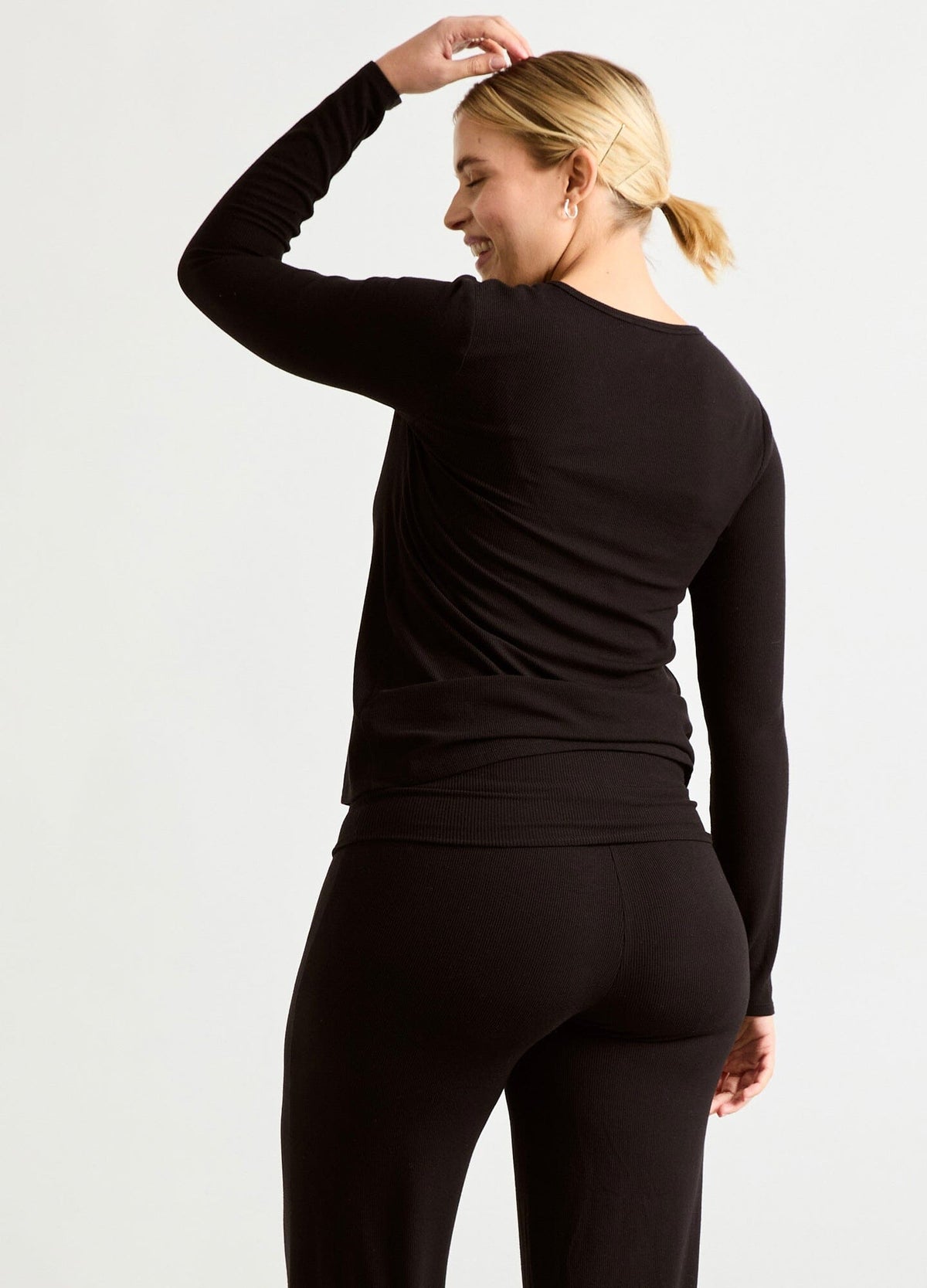 The Softest Rib Nursing Cardigan - Black soft rib-knit nursing cardigan with front buttons, designed for maternity, nursing, and postpartum comfort.