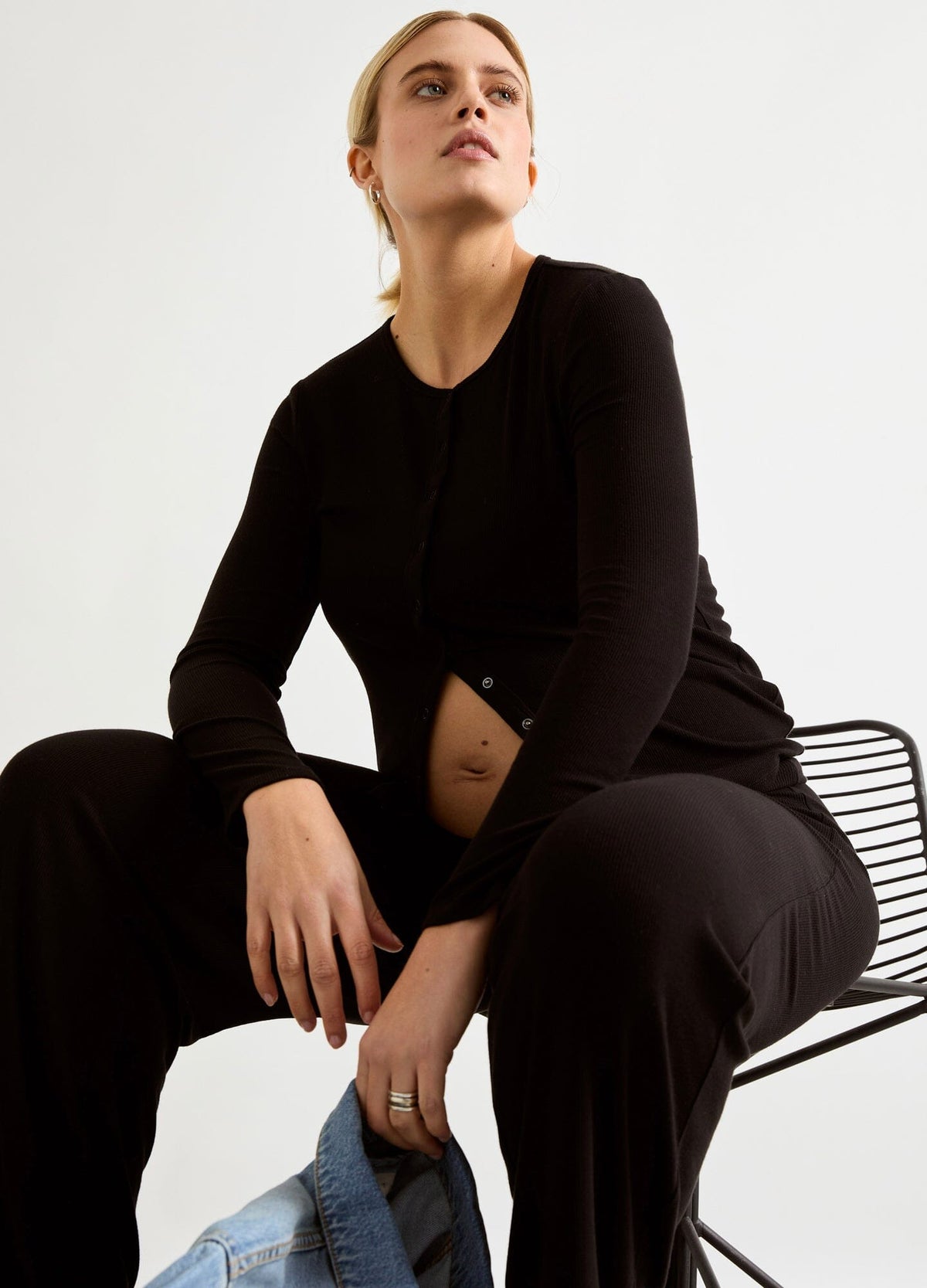 The Softest Rib Nursing Cardigan - Black soft rib-knit nursing cardigan with front buttons, designed for maternity, nursing, and postpartum comfort.