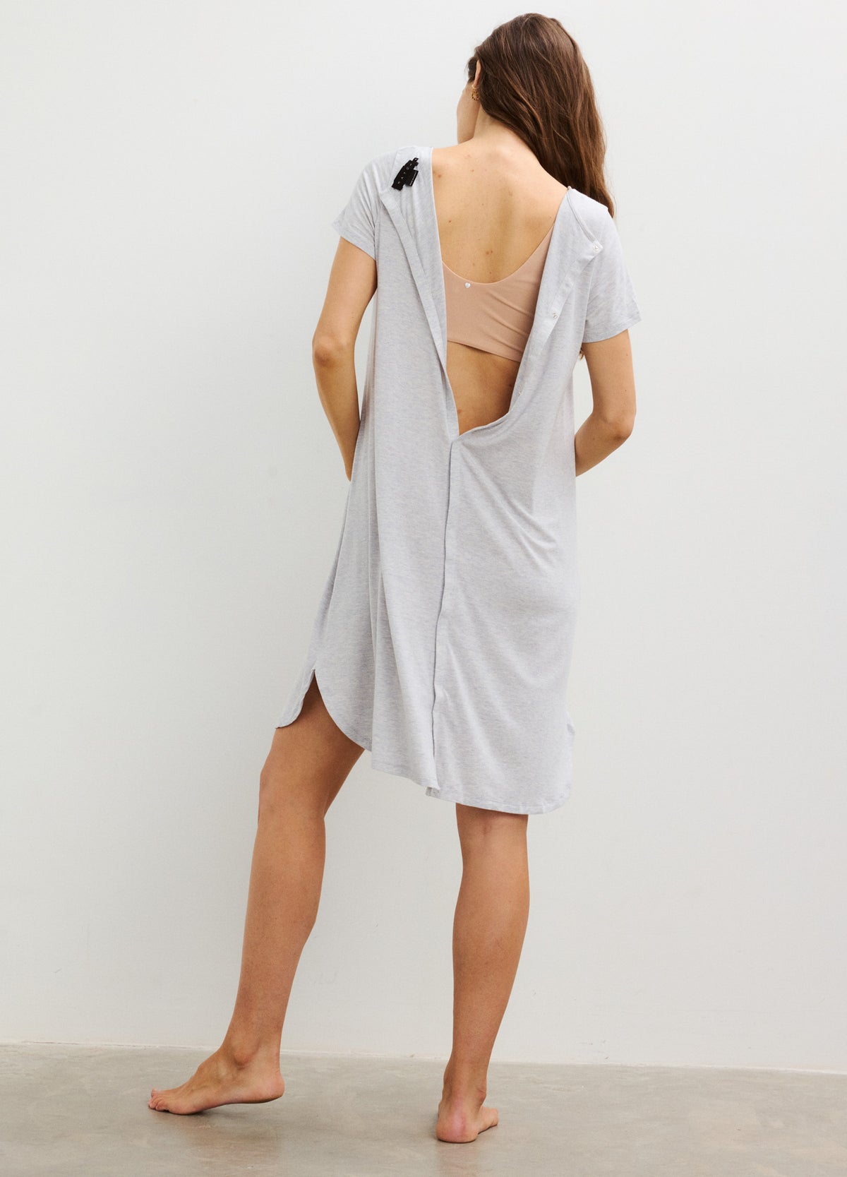 Light gray maternity nightgown with short sleeves and deep back slit for easy nursing access, soft fabric.