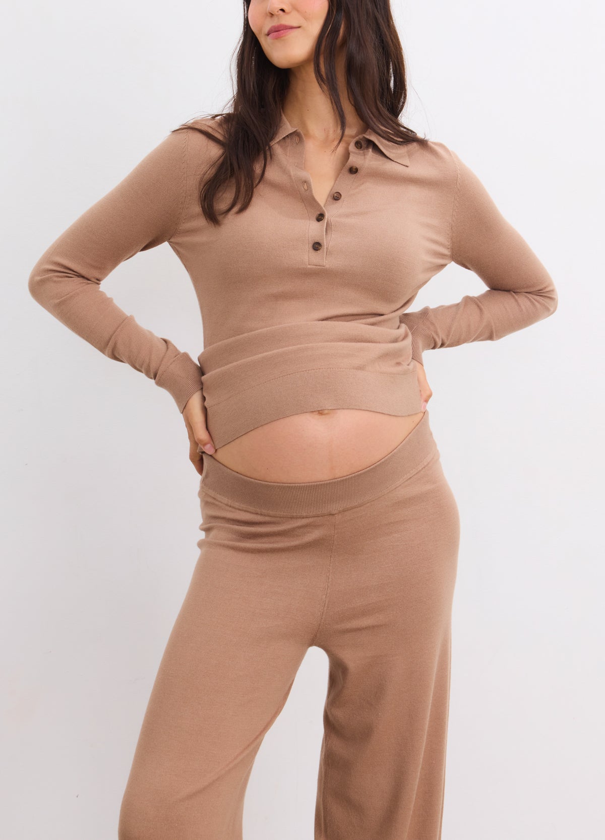 Mocha knit maternity crop pant with soft stretch fabric, worn by pregnant model.