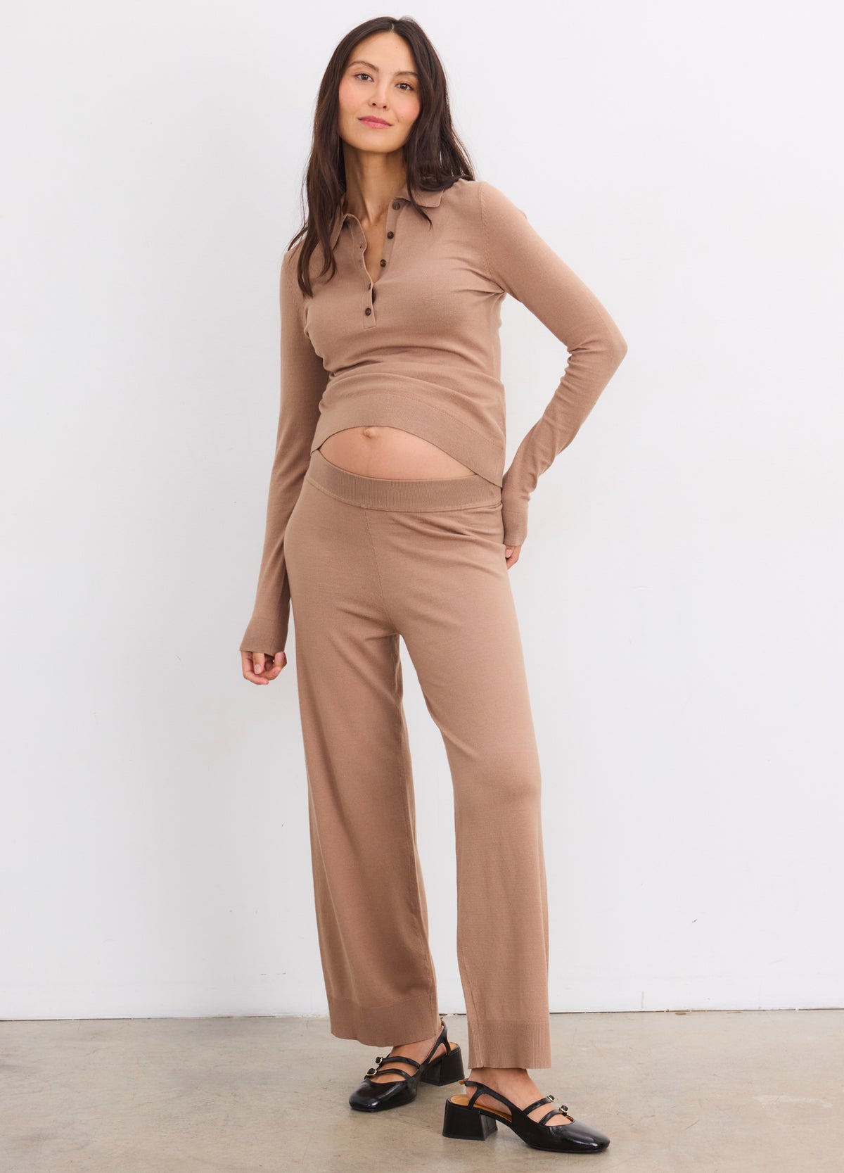Maternity softsculpt knit crop pants in mocha with elastic waistband, worn by pregnant model.