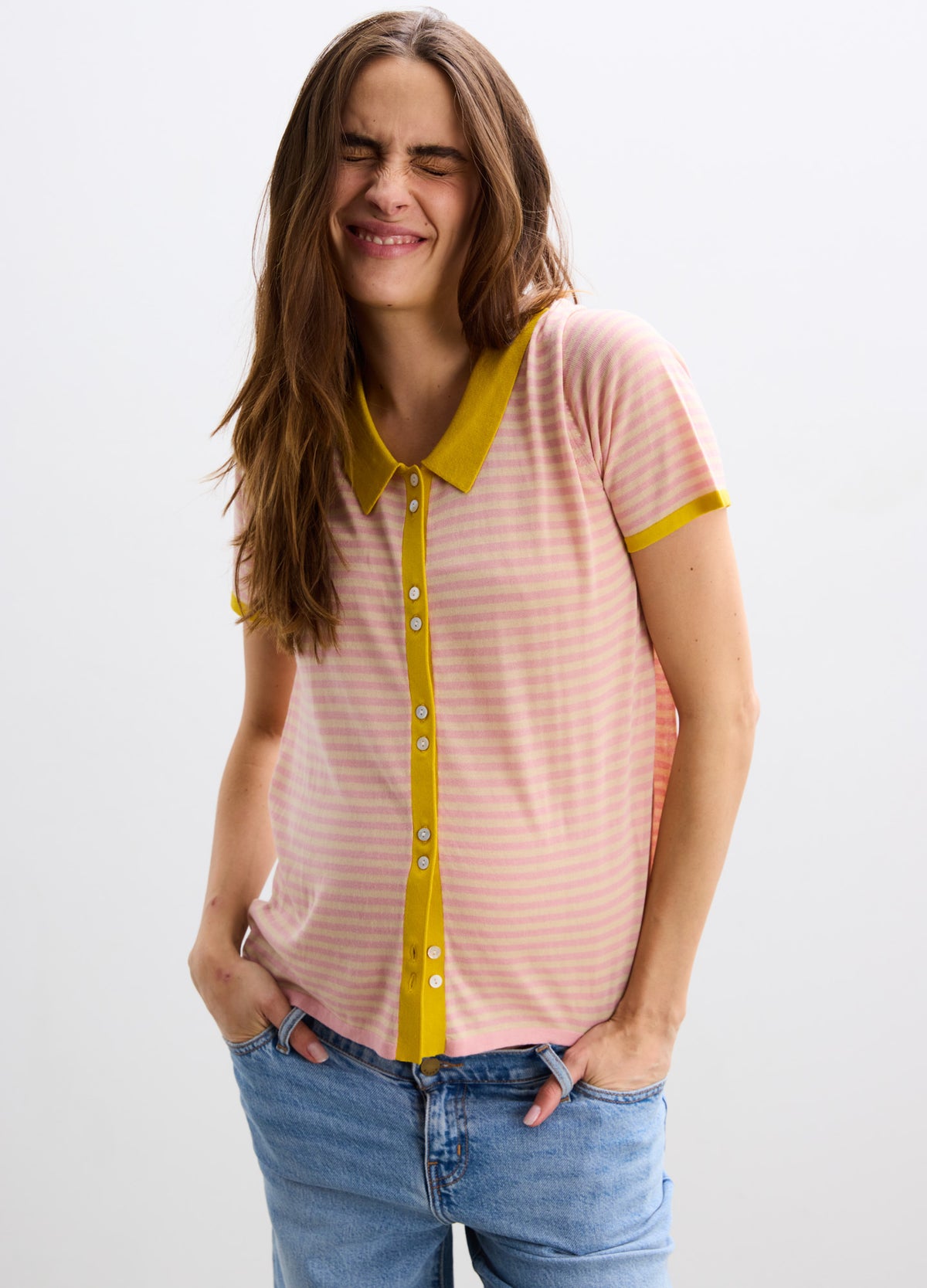 Pink and white striped maternity shirt with yellow collar and button placket, short sleeves.