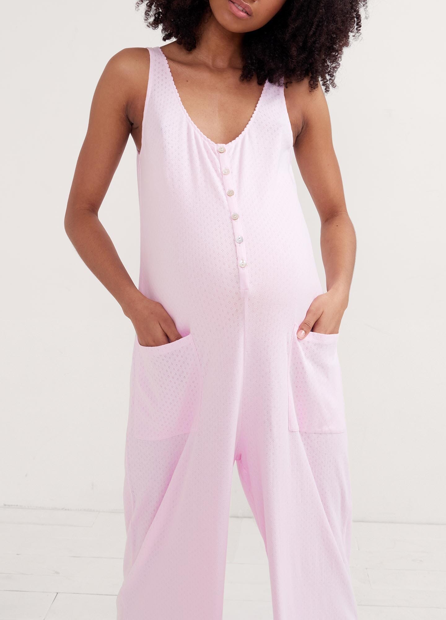 The 24/7 Feeding Jumpsuit POS - Lilac maternity jumpsuit with sleeveless V-neck, nursing-friendly front buttons, and wide-leg fit for postpartum comfort.
