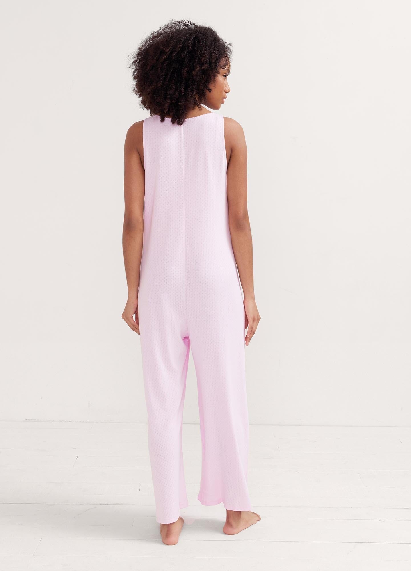 The 24/7 Feeding Jumpsuit POS - Lilac maternity jumpsuit with sleeveless V-neck, nursing-friendly front buttons, and wide-leg fit for postpartum comfort.
