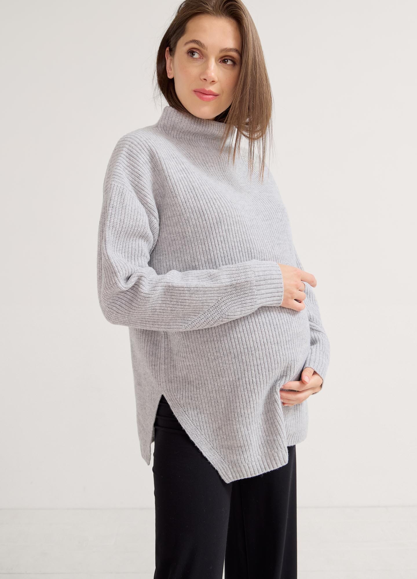 The Cozy Shaker Turtleneck - Heather grey melange maternity turtleneck sweater with side slits for nursing and postpartum comfort.