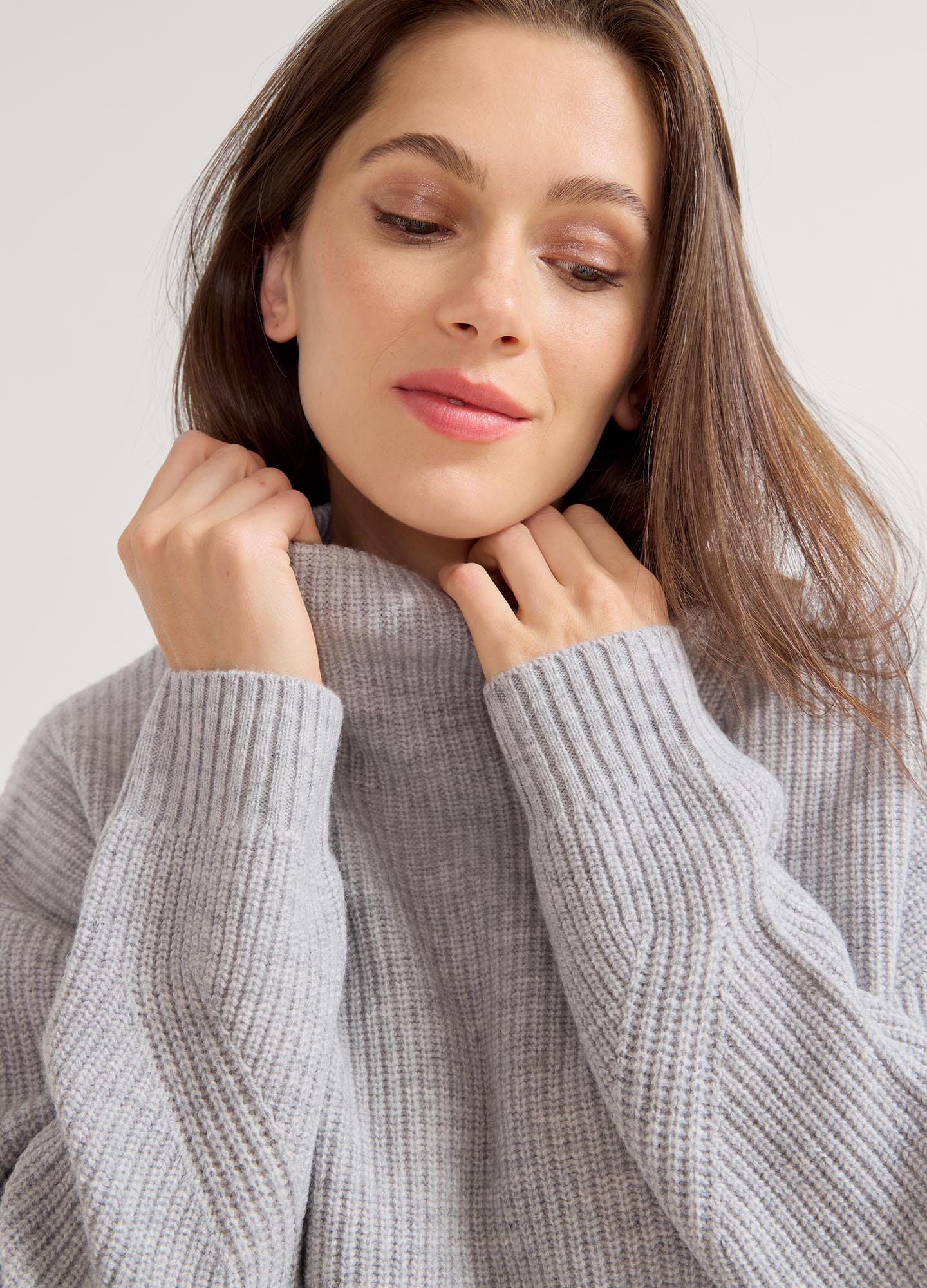 The Cozy Shaker Turtleneck - Heather grey melange maternity turtleneck sweater with side slits for nursing and postpartum comfort.