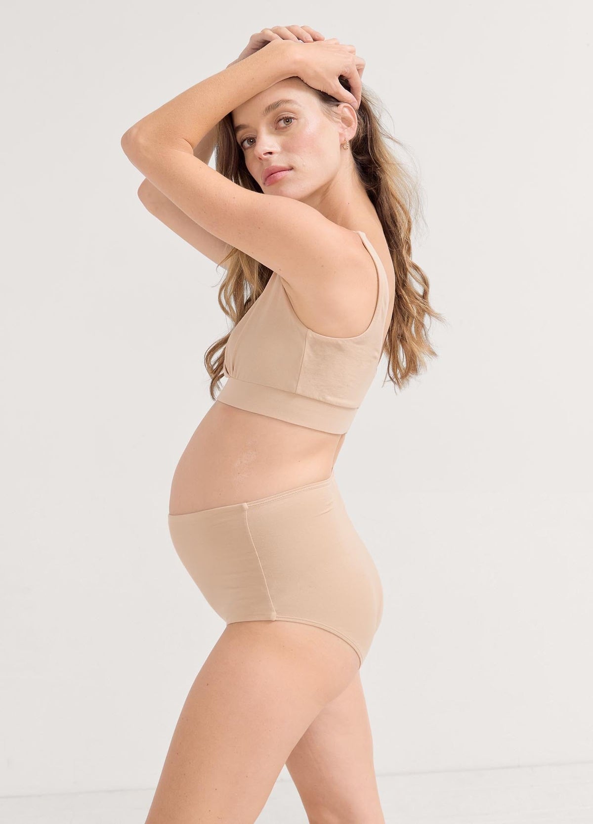 The Dream Feed Nursing And Sleep Bra - Soft pink maternity nursing bra with ditsy wildflower print, designed for pregnancy and postpartum comfort.