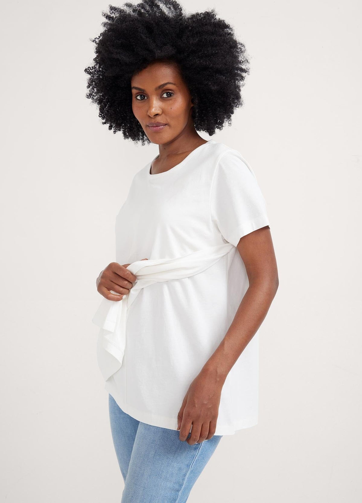 The Luxe Nursing Tee - White short-sleeve maternity nursing tee with scoop neckline, designed for pregnancy and postpartum comfort.