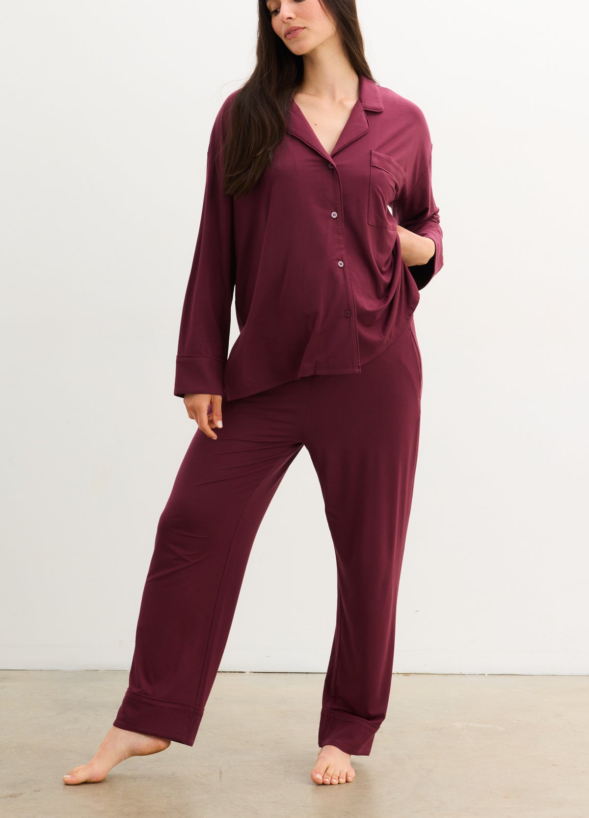 Soft burgundy maternity pajama set with button-up long-sleeve top and relaxed pants.