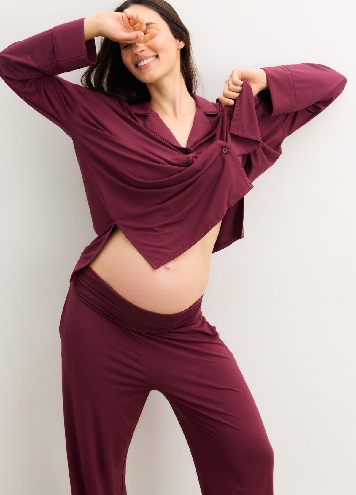 Maternity burgundy ultra-soft jersey pajama set with long-sleeve wrap top and relaxed pants.