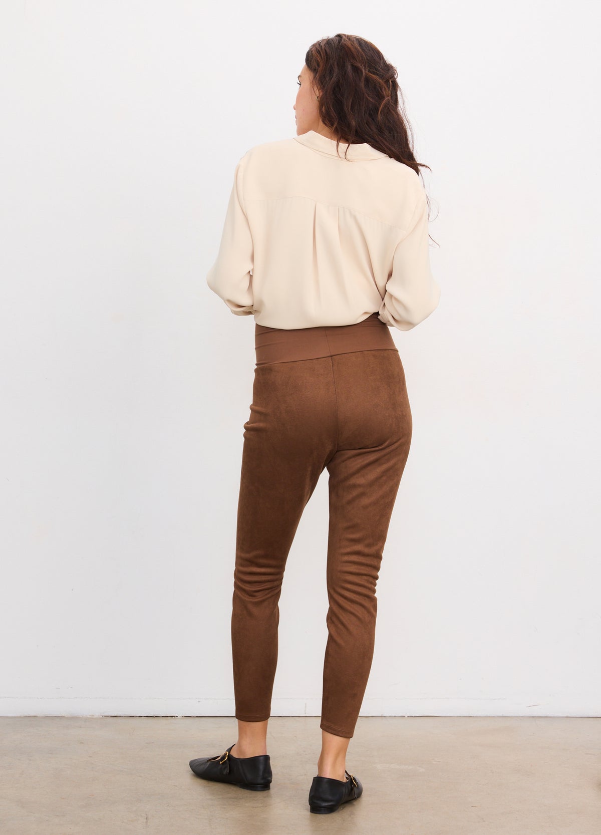 Brown vegan stretch suede maternity leggings with a slim fit and high waistband.