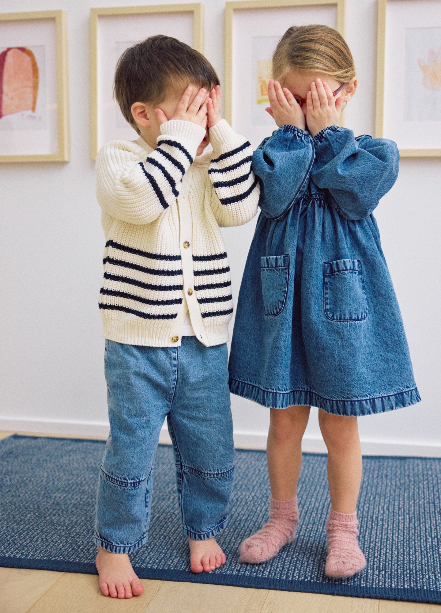 Blue denim maternity barrel pants with a relaxed fit and rolled cuffs.