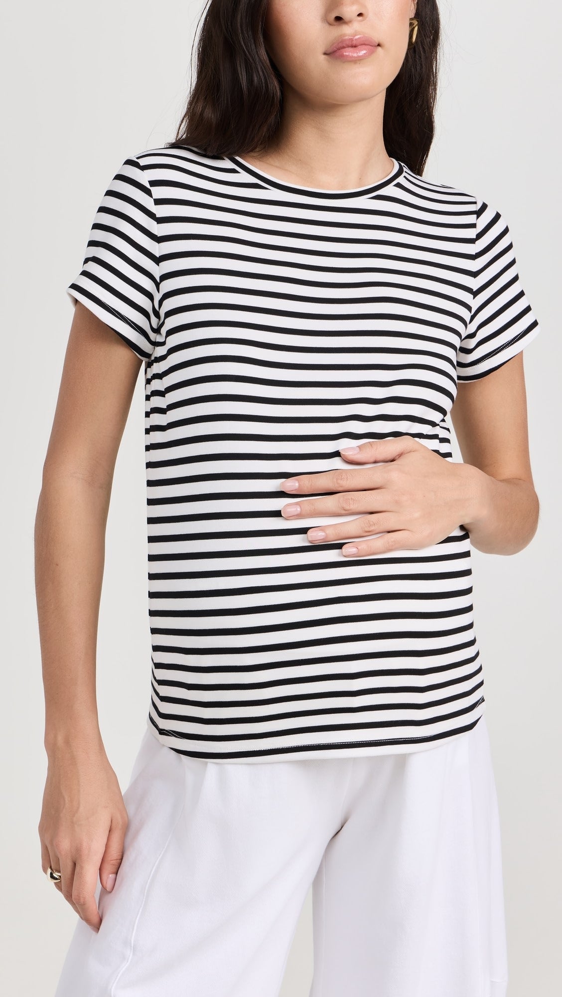 Black and white striped short-sleeve maternity crewneck top with a relaxed fit.