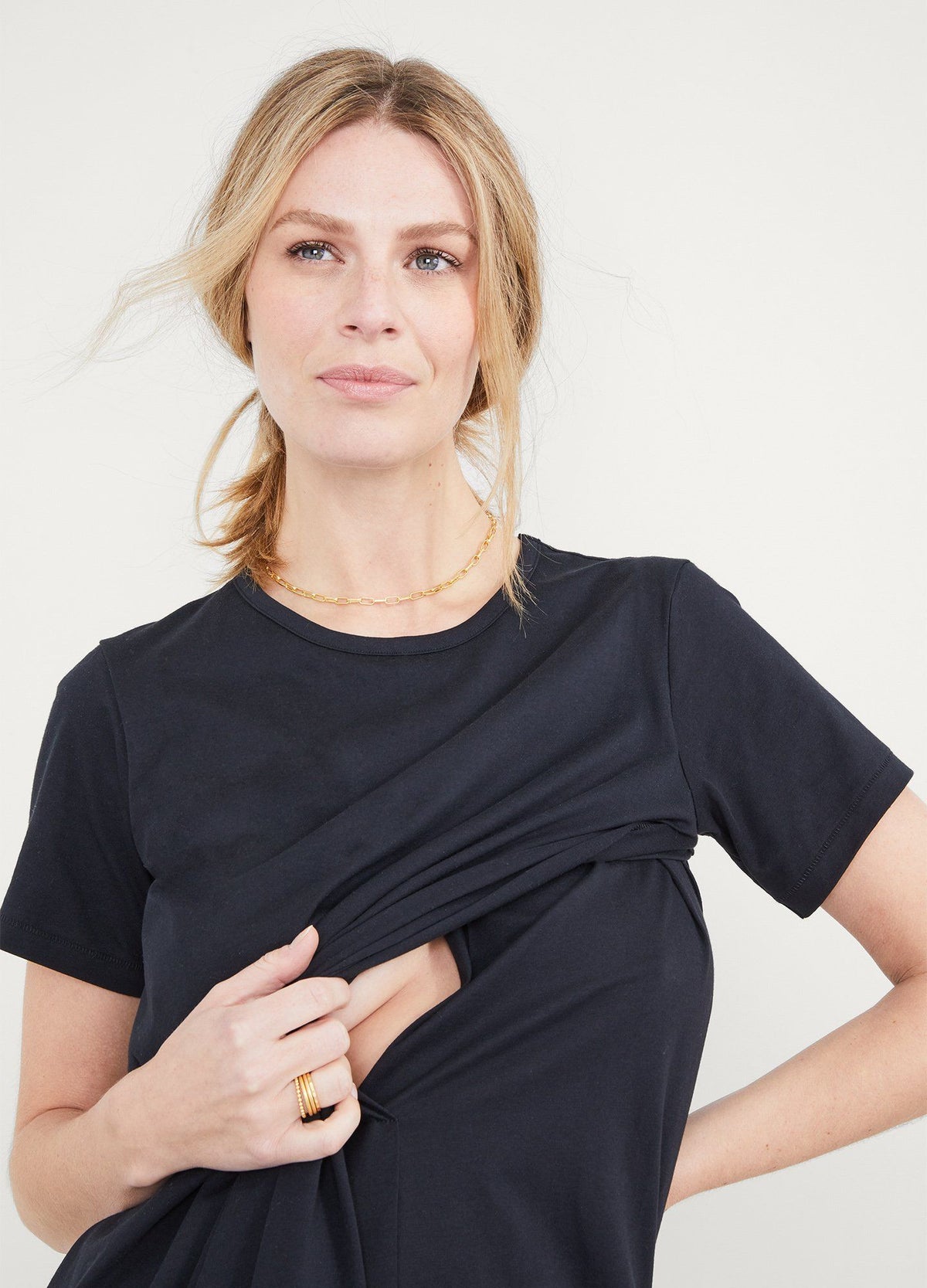 The Easy Going Nursing Tee Dress - Black maternity nursing tee dress with short sleeves, crew neck, and relaxed fit ideal for pregnancy and postpartum.