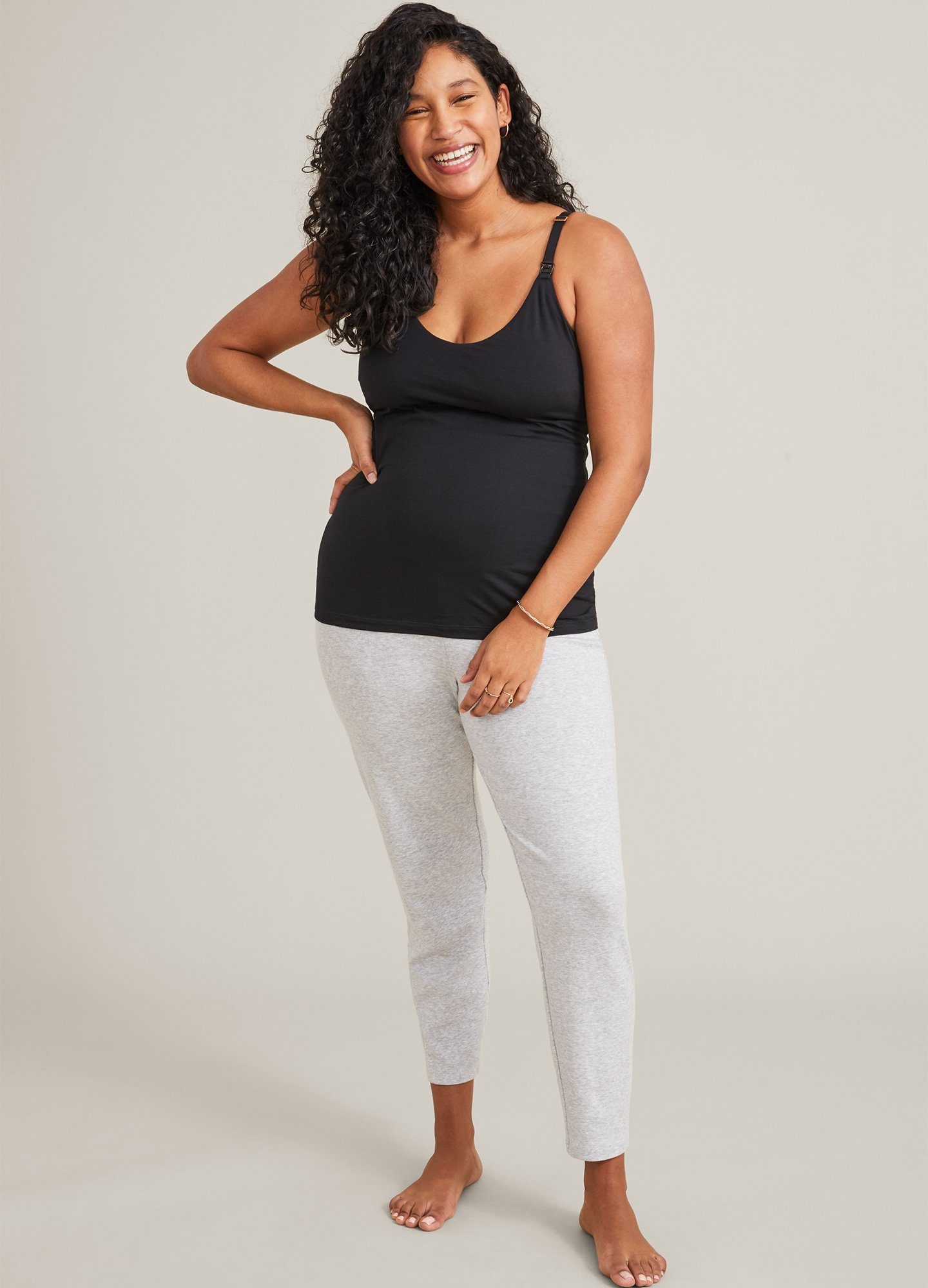 The 24/7 Nursing Tank POS - Buff-colored nursing tank with scoop neckline and slim straps, designed for maternity and postpartum wear.