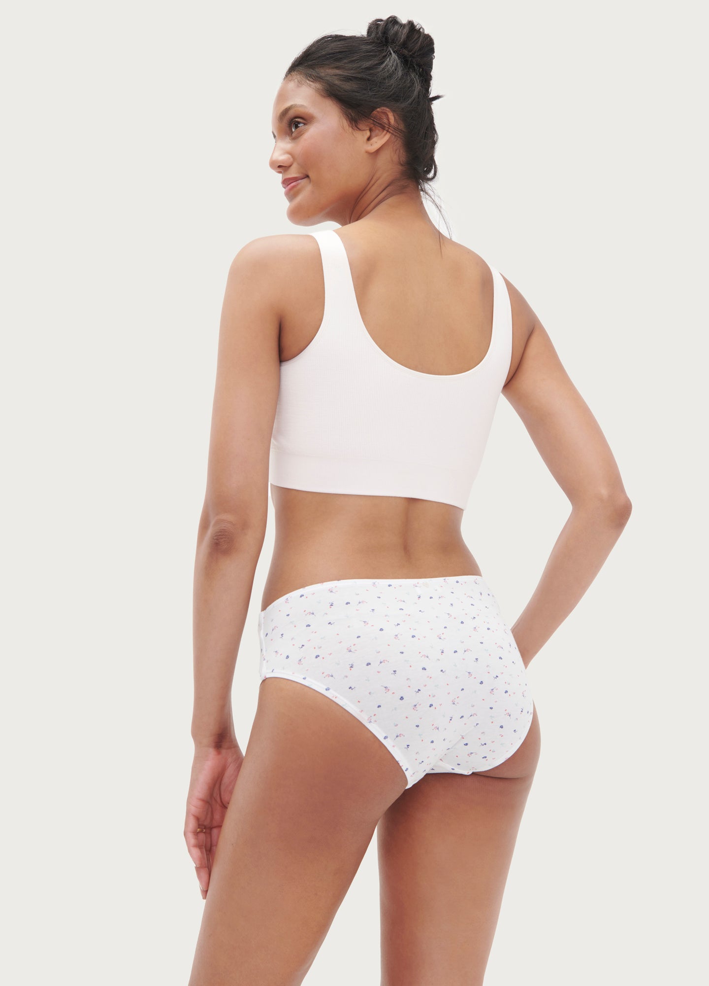 The Everyday Brief - Soft pink maternity briefs with delicate wildflower print, designed for pregnancy, nursing, and postpartum comfort.