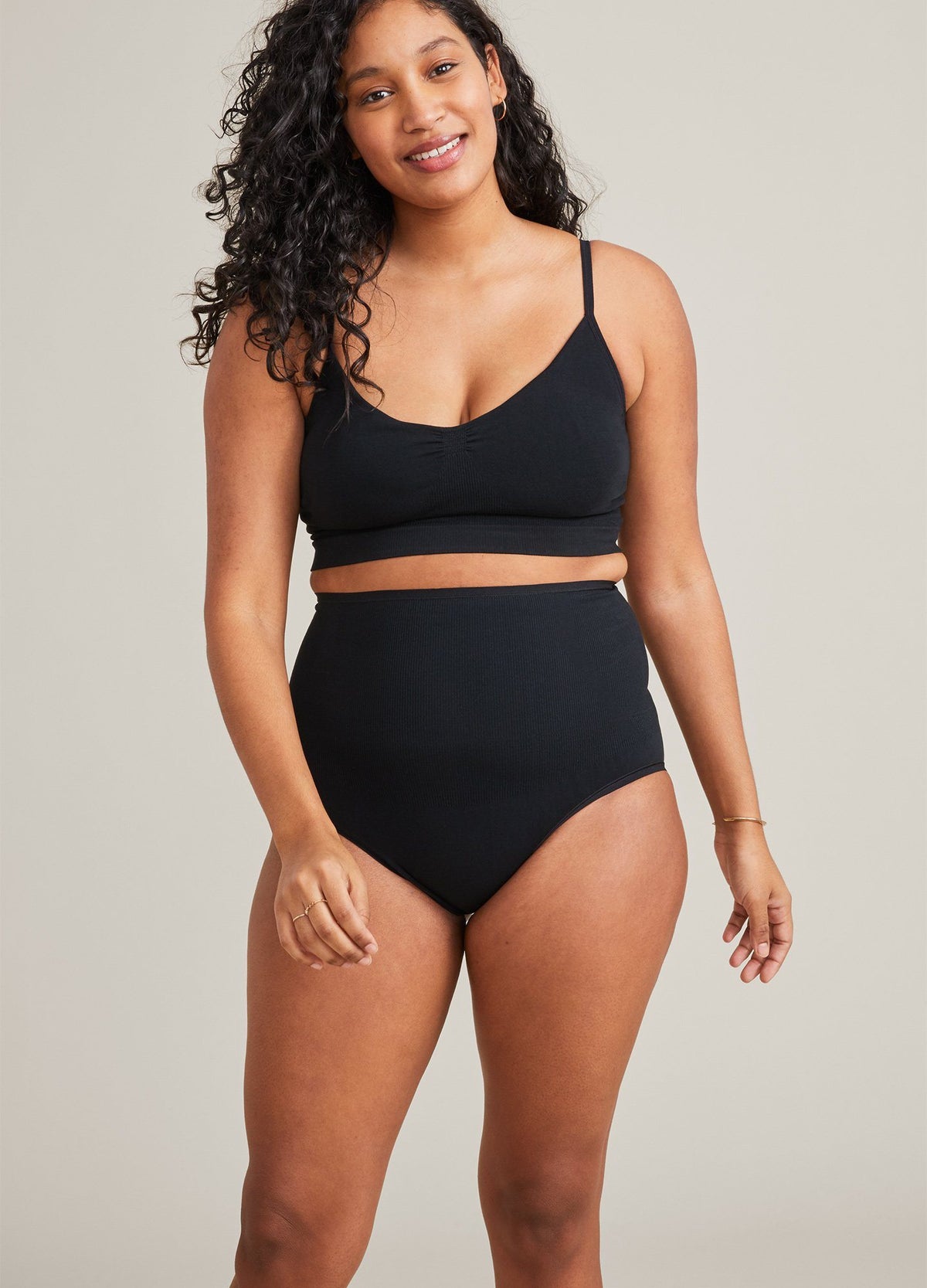 The Seamless Belly Brief - Black seamless high-waisted belly brief designed for maternity, pregnancy, nursing, and postpartum support.