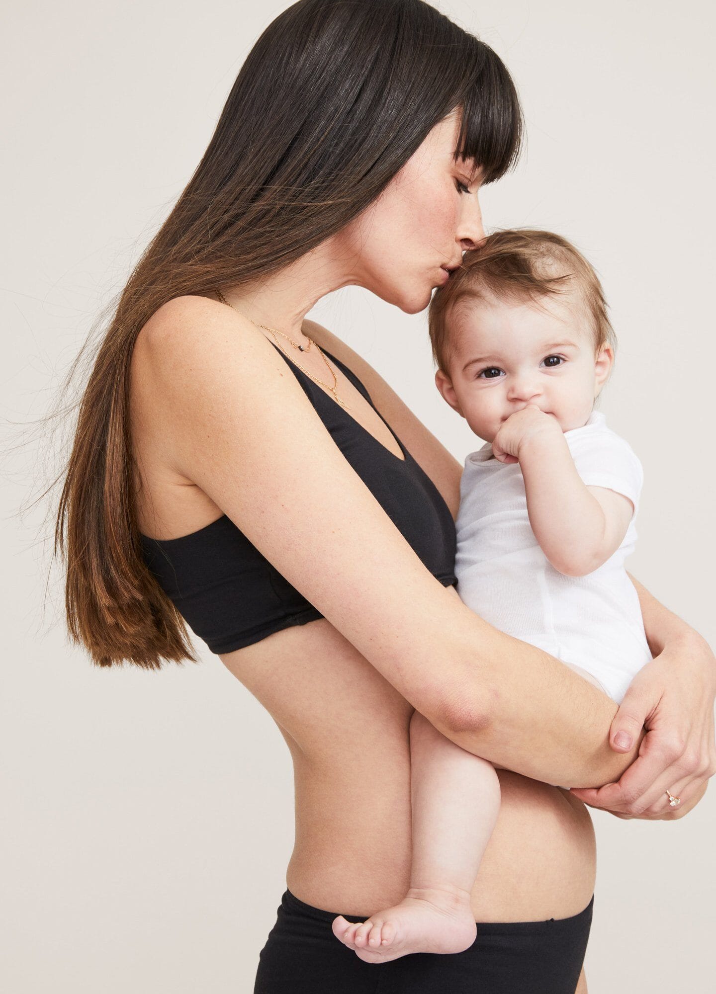 Black maternity bra with wide straps and seamless cups designed for comfort and support.