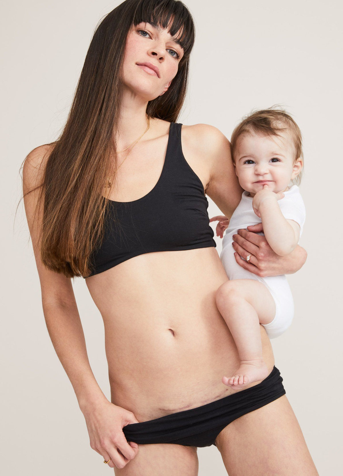 The Everyday Brief - Black seamless maternity brief and matching nursing bra with soft stretch fabric designed for pregnancy and postpartum.