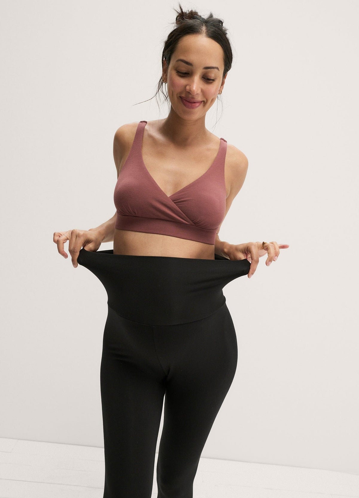 The Ultra Soft Before, During And After Legging - Black high-waist maternity leggings with soft stretch fabric, modeled for pregnancy and postpartum comfort.